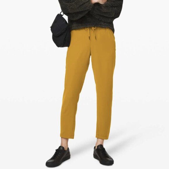 Lululemon On the Fly 7/8 Pant *Woven Fools Gold Mustard Mid-Rise Size 10 - Picture 1 of 16